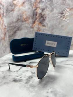 Солнцезащитные очки Gucci