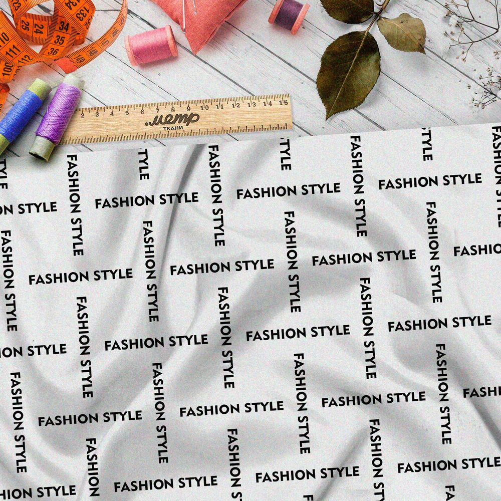 Ткань таффета стильная клетка из чёрных надписей на бежевом фоне