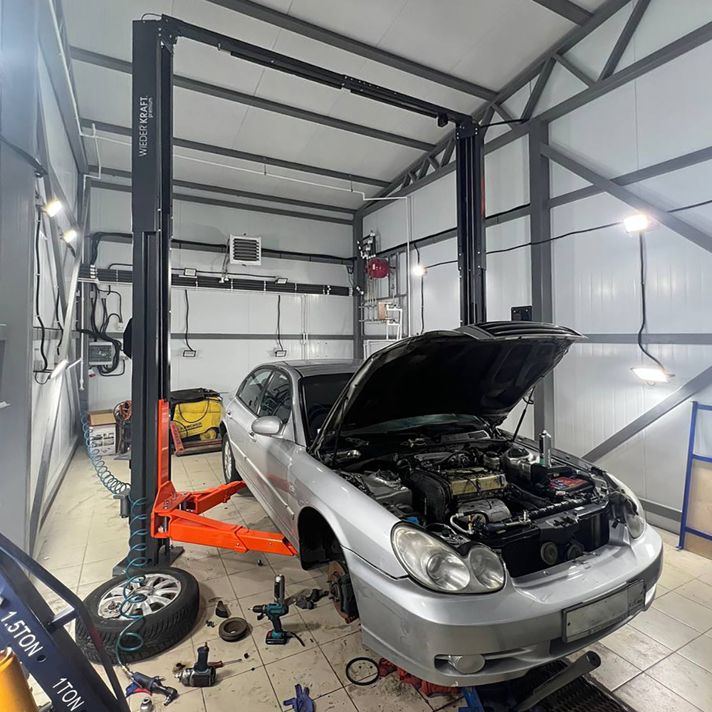 WDK-535 Подъемник двухстоечный с верхней синхронизацией 4,5 тонн, одност. разбл., 380В