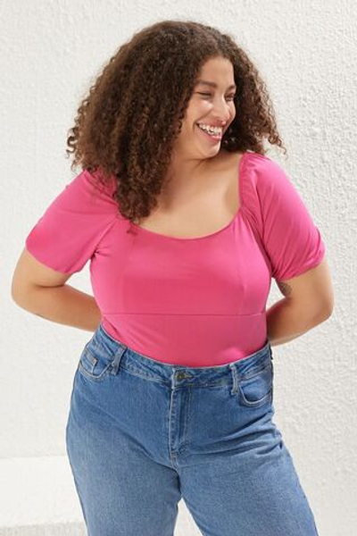 Розовая вязаная блузка