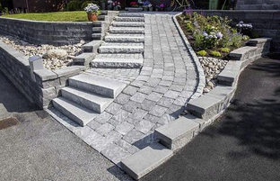 Как уложить тротуарную плитку на склоне