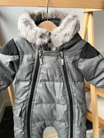 Пуховый комбинезон Baby Dior, 68