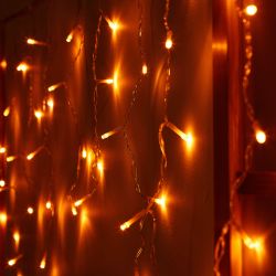 ULD-B12006-195-TTK AMBER IP44 Бахрома светодиодная с эффектом мерцания. 12м. Соединяемая. 195 светодиодов. Янтарный свет. Провод прозрачный. ТМ Uniel
