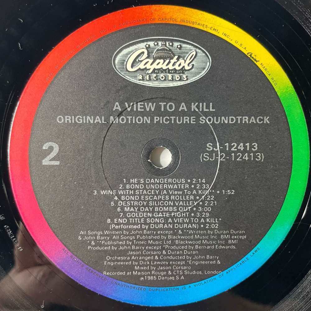 Винтажная виниловая пластинка LP James Bond 007 Вид На Убийство John Barry A View To A Kill (Motion Picture Soundtrack) (USA 1985)