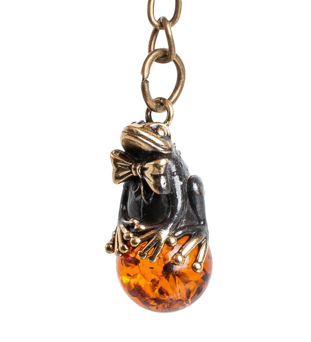 AM- 843 Брелок «Лягушка на шарике с бантиком» (латунь, янтарь)