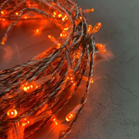 Светодиодная гирлянда с возможностью динамики 20 м., 200 оранжевых LED ламп, 24V., прозрачный силиконовый провод, IP65, Beauty Led (EST200-3W10-1OR)