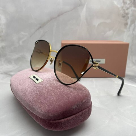 Солнцезащитные очки MIU MIU