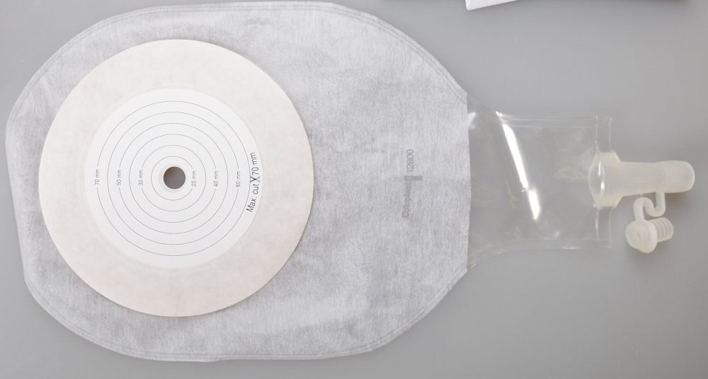 Послеоперационный калоприемник 12802, Coloplast с окном, в/отв. 10-100 мм, 1 шт.