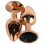 Золотистая анальная пробка с черным кристаллом - 6,8 см. (Цвет: черный)