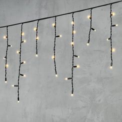 Светодиодная бахрома с колпачком 3,1*0,5 м., 120 теплых белых LED ламп, каучуковый черный провод, LTC (LL120-1-2WW)