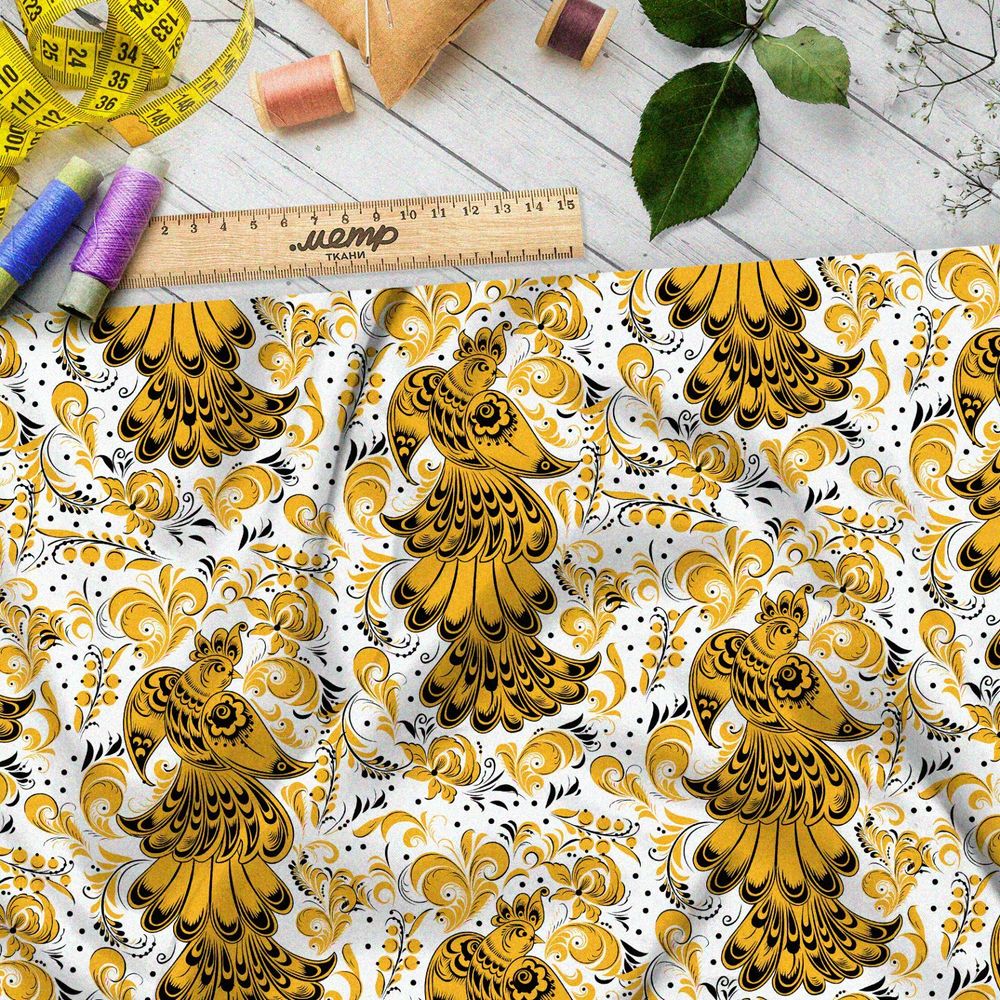 Ткань интерлок хохлома из золотых жар-птиц на белом фоне