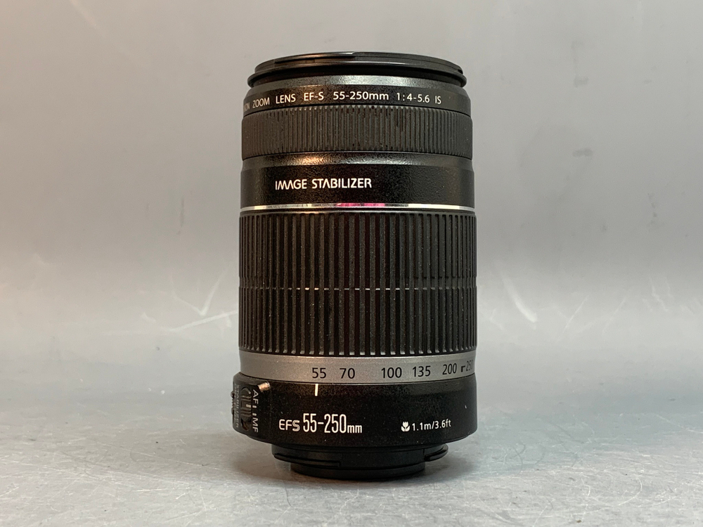 Canon EF-S 55-250mm 4-5.6 IS царапка на передней линзе