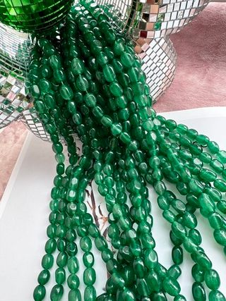 Нить бусин из тонированного кварца 7-8мм (галтовка)