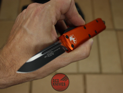 Нож Microtech UTX-85 S/E - оранжевая рукоять, стандартный клинок, черный + запчасти RK-395