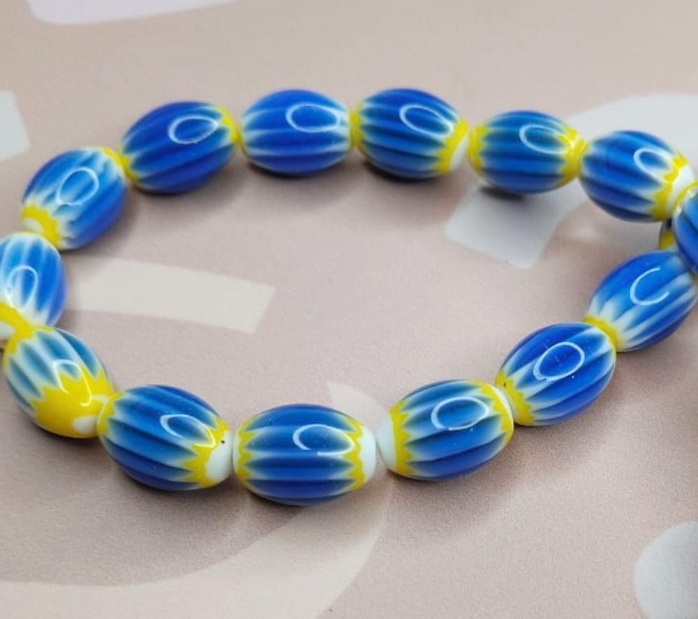 Бусина керамика 14х8 мм темно-синяя желтый