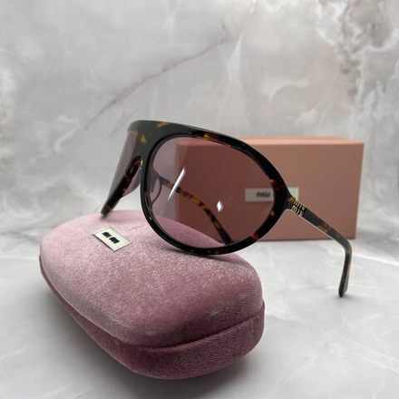 Солнцезащитные очки MIU MIU