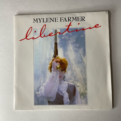 Винтажная виниловая пластинка 7 дюймов (маленькая пластинка) Mylene Farmer Libertine (Франция 1986)
