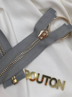 Молния серая с золотистым массивным кольцом