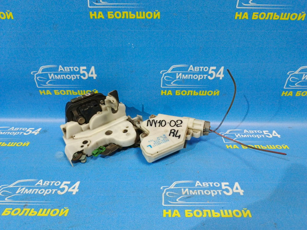 Замок двери задней левой NISSAN WINGROAD 1996