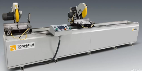 Автоматический торцовочный двухпильный станок для профиля ПВХ