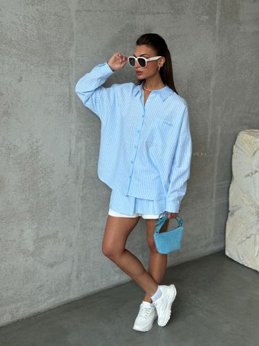 Голубой хлопковый костюм с юбкой-шортами