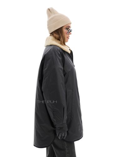 Удлиненная двусторонняя куртка с меховым воротником