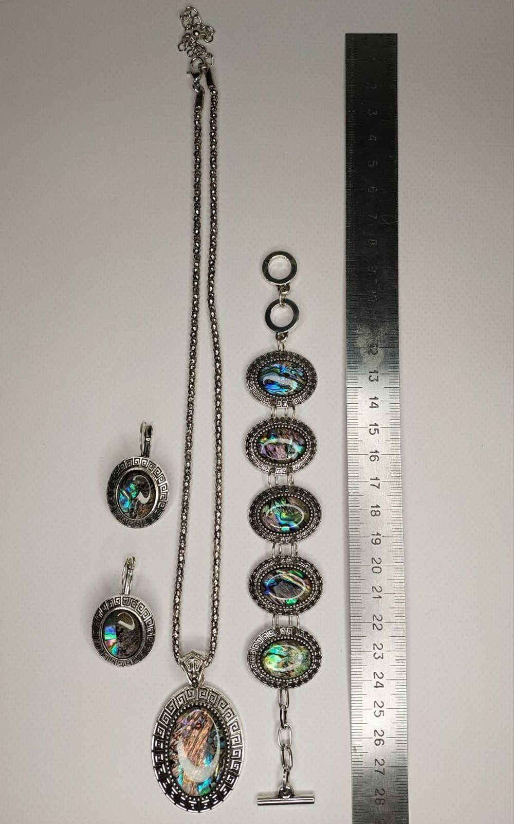 Комплект бижутерии. Подвеска, серьги, браслет с перламутровыми вставками "Перламутр" Форма "Овал"