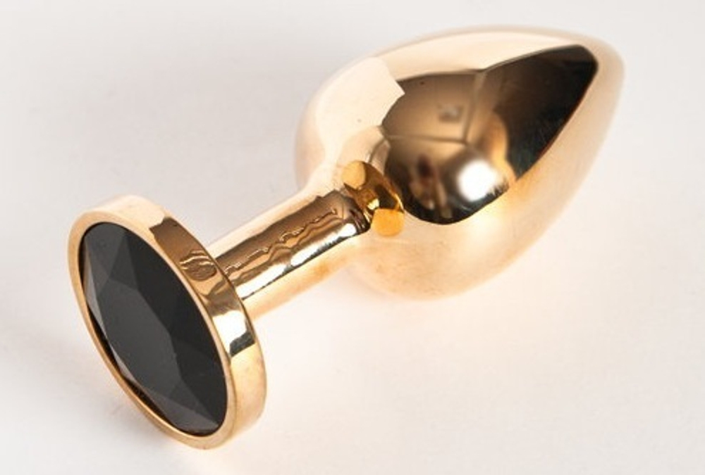 Маленькая золотистая анальная втулка с чёрным кристаллом