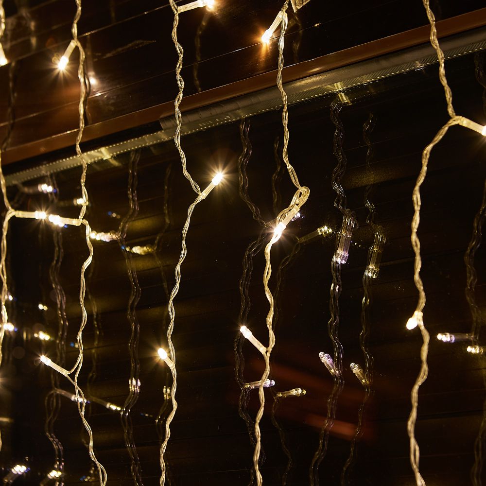 ULD-C1515-100-DTA WARM WHITE IP20 Занавес светодиодный. 1.5х1.5м. 100 светодиодов. Теплый белый свет. Провод прозрачный. TM Uniel