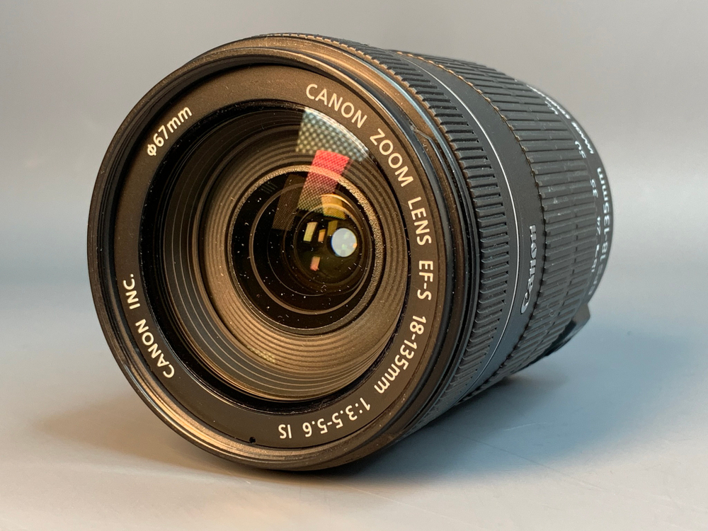 Canon EF-S 18-135mm пыль внутри передней линзы