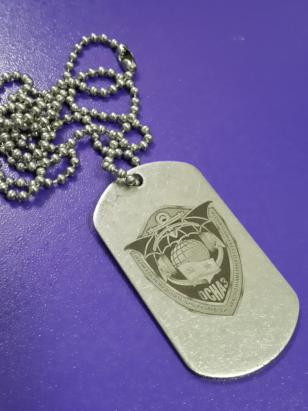 Стальной жетон с изображением