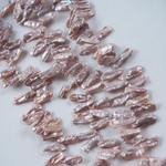 Жемчуг культивированный Бива, розовый, с эффектом хамелеона, со смещенным боковым отверстием 15-22*5-10мм