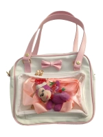 Сумка через плечо с прозрачным окошком розовый бант
