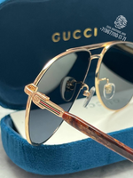 Солнцезащитные очки Gucci