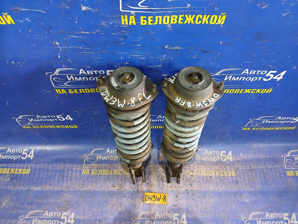 Стойка передняя левая MAZDA DEMIO 1998