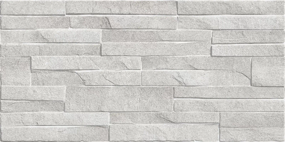 Настенная плитка Alma Ceramica TWU2550DCV14 Discover 24.9x50 серая глянцевая / рельефная под камень / под кирпич