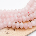 Розовый кварц бусины (тонированный, сорт Б), размер около 8,3*5,5 мм, цена за 15-16 шт (1/4 нити)