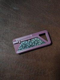 Нож для сменных трапециевидных лезвий.