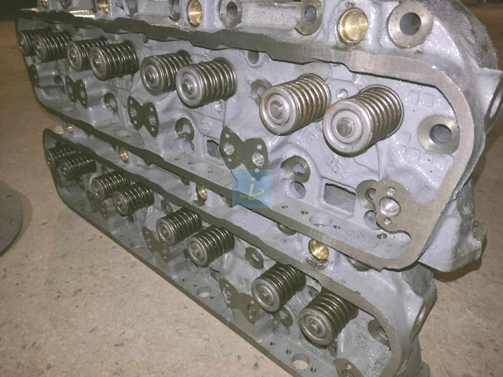 Головка блока цилиндров в сб. с клапанами (Н.О) 238-1003009