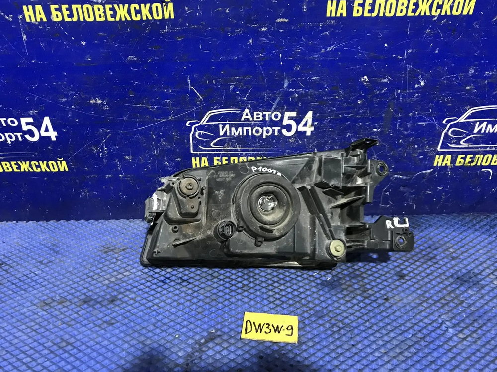 Фара передняя правая MAZDA DEMIO 2000