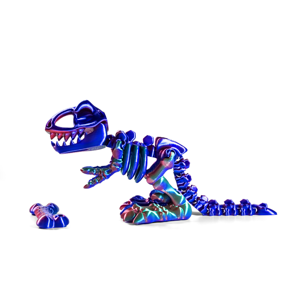 Динозавр-скелет Ти-Рекс (T-rex Dino) с косточкой, гибкая фигурка, красно-сине-зеленый