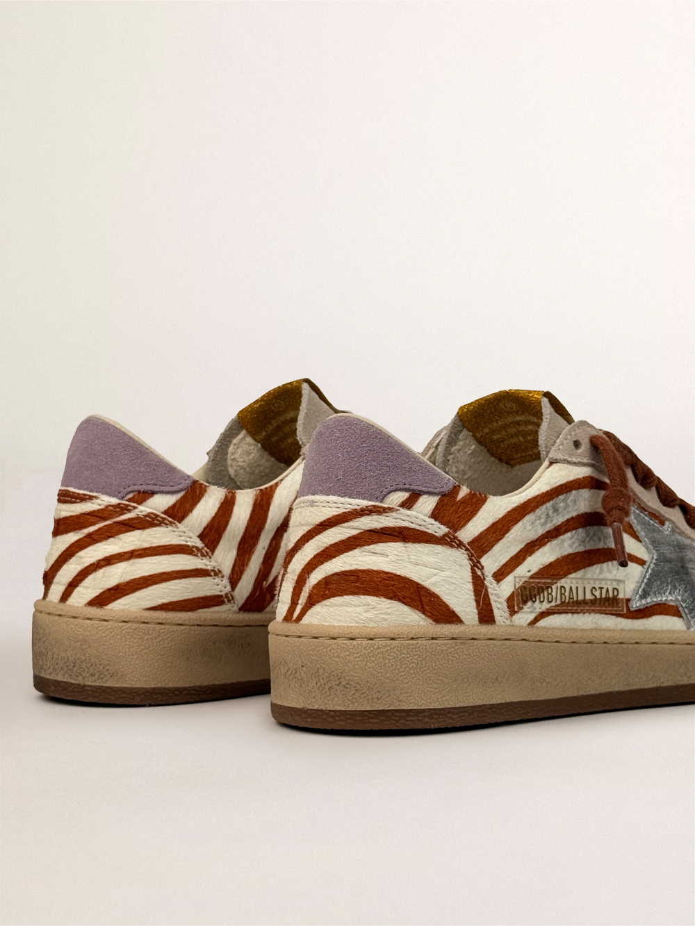 Ball star in zebra-print pony skin with silver leather star