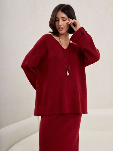 Трикотажный костюм с юбкой бордового цвета