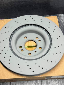 Тормозной диск передний Mercedes-Benz A1664211012