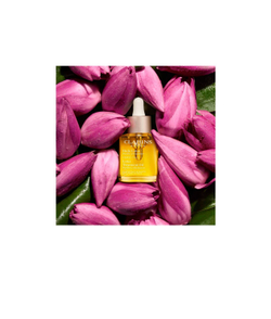 Clarins Lotus Treatment Oil - регенерирующее масло с разглаживающим эффектом для дня и ночи /   30  ml  / GTIN 3666057030956