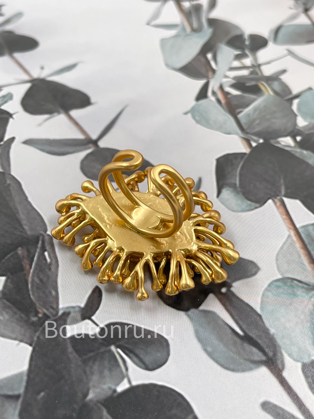 Кольцо Скиапар. крупное золотистое в форме глаза со стразами