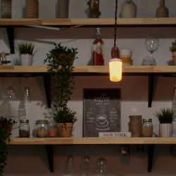 LED-L60-6W-FLAME-E27-FR PLD01WH Лампа светодиодная декоративная с типом свечения эффект пламени. Форма цилиндр. матовая. Картон. ТМ Uniel.