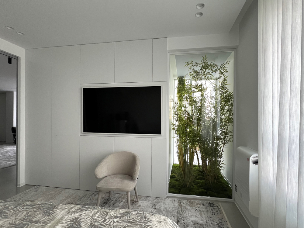 Озеленение искусственными растениями частного интерьера