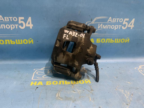 Суппорт тормозной передний левый NISSAN CEFIRO 1998