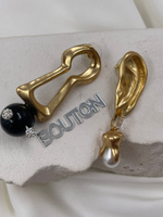 Серьги Скиап. золотистые в виде замочной скважины и уха